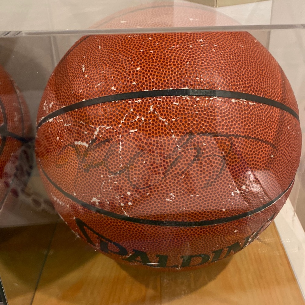 A vintage basketball signed by Kobe Bryant